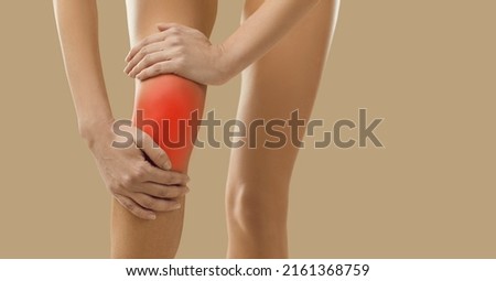 Banner wide shot of woman legs on yellow background with spasm in kneecap. Acute pain in knee concept. Unhealthy female suffer from arthrosis or osteoarthritis. Healthcare concept. Сток-фото © 
