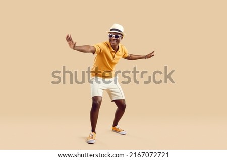 Similar – Image, Stock Photo Man in trendy outfit and sunglasses on blue background