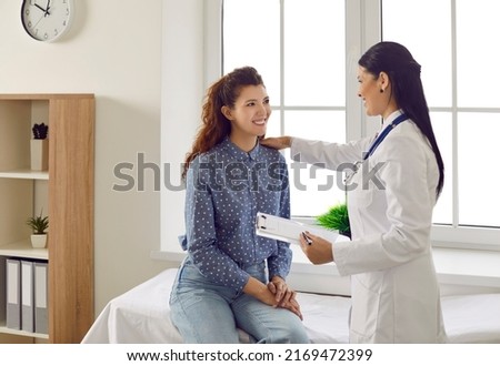 Similar – Image, Stock Photo Positive female patient sitting on bed in hospital