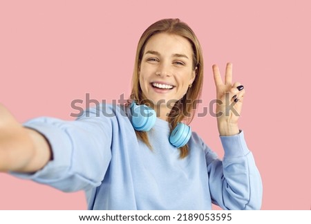 Image, Stock Photo Two teenager girls taking a selfie.