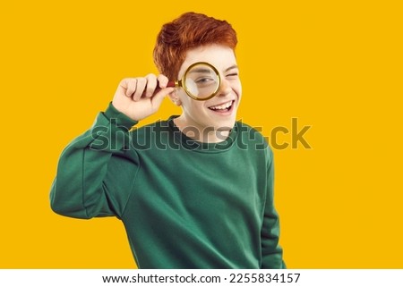 Similar – Image, Stock Photo Child looking through a toy kaleidoscope