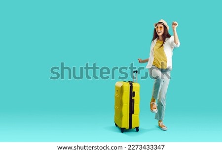 Image, Stock Photo Traveling woman with suitcase in airport