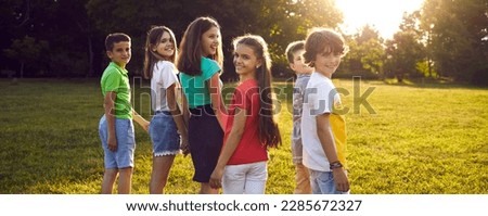 Similar – Image, Stock Photo Rear view child walking with bucket through fields