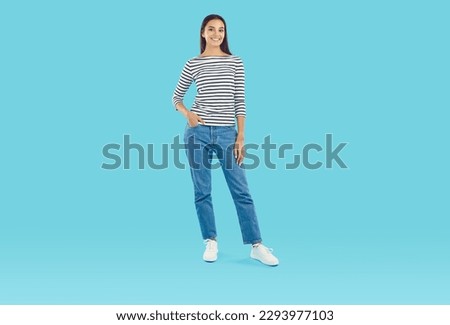 Similar – Image, Stock Photo Three legs in jeans and sneakers, standing on the street in confetti, at carnival.