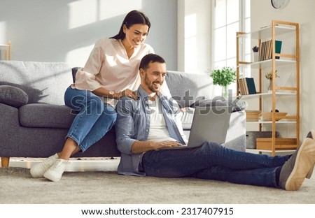 Similar – Image, Stock Photo Happy young married couple spending time together at seaside