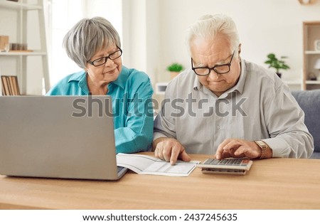 Similar – Image, Stock Photo Senior Couple At Home Sitting On Sofa And Using Mobile Phone Together