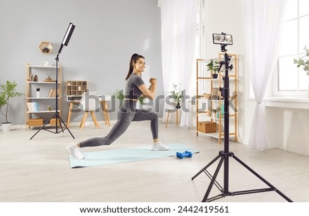 Similar – Image, Stock Photo Woman recording video blog with camera