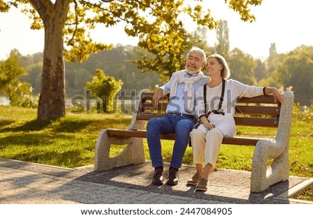 Similar – Image, Stock Photo Happy couple walking on sea