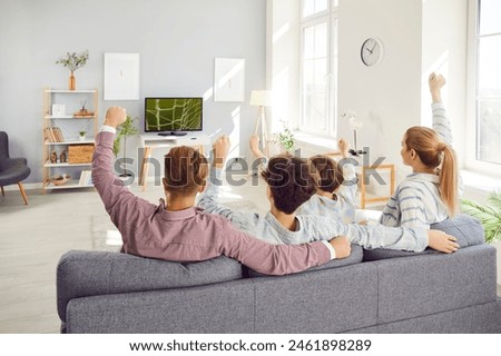 Similar – Image, Stock Photo Excited boy watching match on laptop