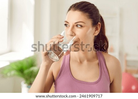 Similar – Image, Stock Photo Happy woman standing on observation deck on hill