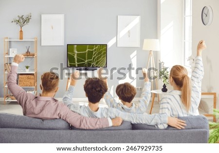 Similar – Image, Stock Photo Excited boy watching match on laptop