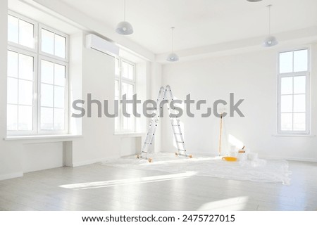 Similar – Image, Stock Photo ladders on white room at construction site. Painting walls. Home improvement, renovation