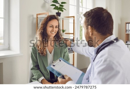 Image, Stock Photo Young women in medical masks taking selfie in countryside