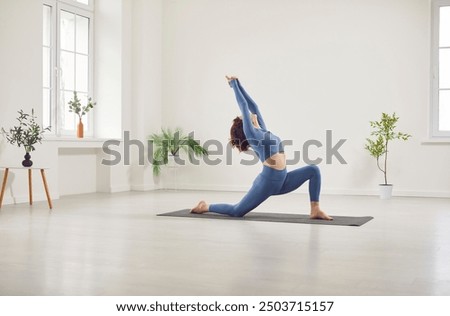 Image, Stock Photo Woman doing yoga in Supported Headstand pose