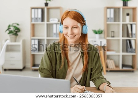 Similar – Image, Stock Photo Young redhead woman sit on grey linen fabric under orange coat with flowers and rowan berries