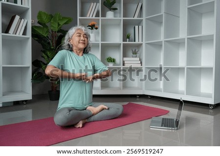 Similar – Image, Stock Photo Focused Senior Woman Practicing Yoga With Hands Clasped