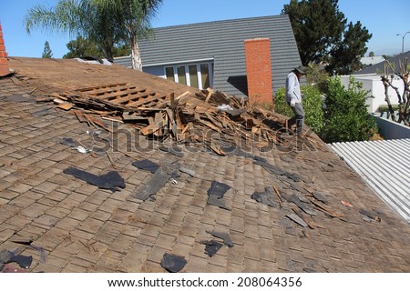 Demolition and removal of an Old Asphalt Single roof that was installed over an old Cedar Shake Roof from the 1960's era. Roofs generally last about 20 years before needing to be replaced.