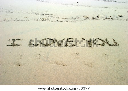 I LOVE YOU written in sand on the beach just in time for Valentines day