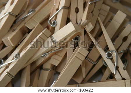 close up of wooden cloths line pins