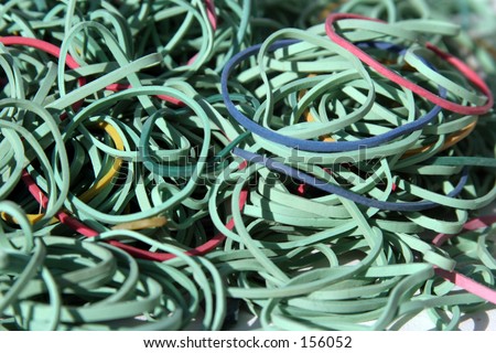 colored rubber bands in a pile