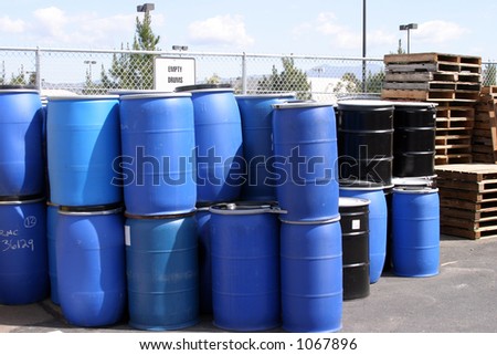 empty plastic drums for chemicals at a recycling location