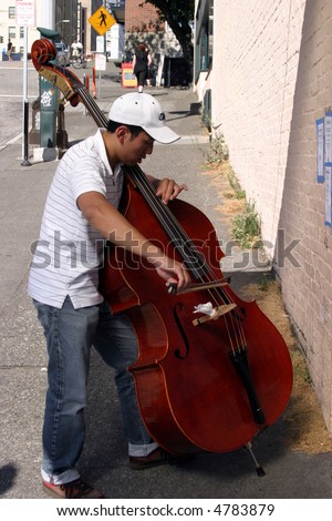 a person plays a cello for \
