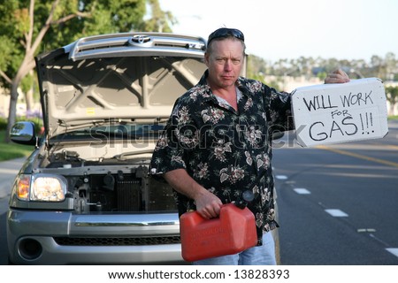 a man out of gas holds an empty gas can and a 