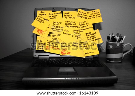 sticky notes with messages stuck to a laptop computer screen