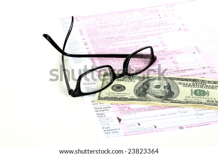 us tax forum with refund and glasses isolated on white
