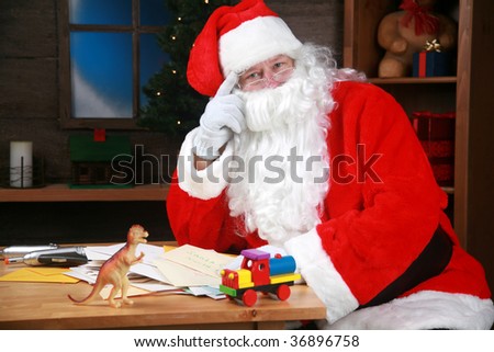 Santa reads his \