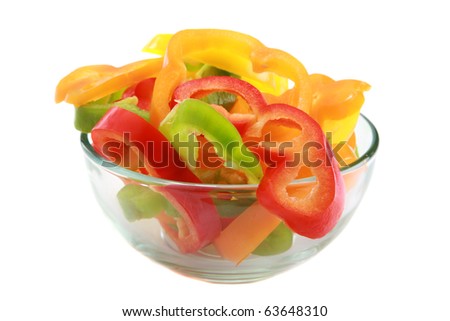 Delicious fresh cut Bell Pepper slices of Green, Yellow, Orange and Red Isolated on white