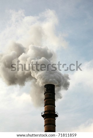 an industrial smoke stack belches out noxis smoke and crud including dreaded CO2 and other global warming gasses freely into the automosphere quickly ruining our earth and enviroment for all