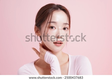 Similar – Image, Stock Photo Stylish young asian woman dressed in casual wear looking to mobile phone screen when posting photos in social media and thinking about interesting content text. Lifestyle blogger checking blog comments outdoor at autumn