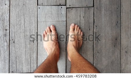 Similar – Image, Stock Photo Top view bare feet of male and female couple standing on wooden bridge