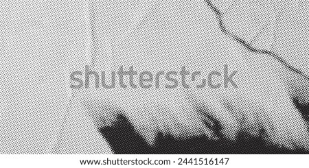 Top view of wrinkled textured translucent paper covering sharp scissors on table in light room during Rock paper scissors game