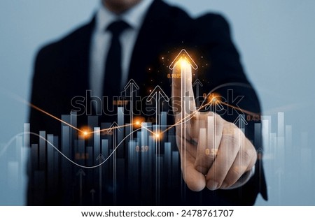 Similar – Image, Stock Photo Graph of price growth and indicators. Analysis of indicators on a virtual screen by a businessman in a suit. Growth of business indicators, high profit