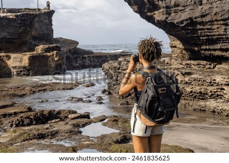 Similar – Image, Stock Photo Woman photographing rocky formations on smartphone