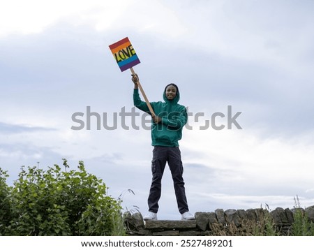 Similar – Foto Bild Auf Stein stehender Junge mit VR-Brille gegen Berg