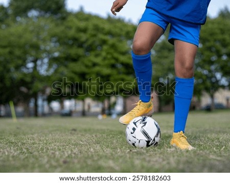 Similar – Image, Stock Photo Low section child with red rubber boots walking on puddle