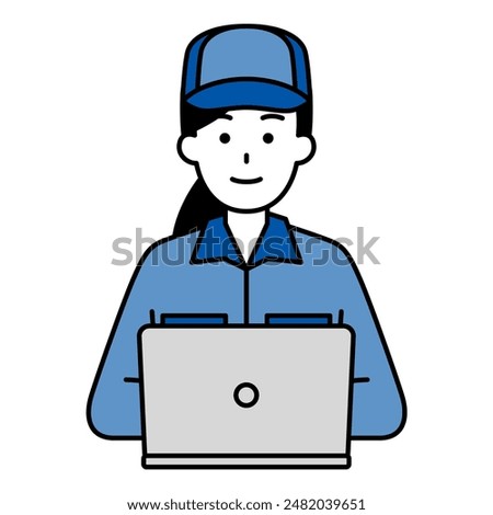 Female worker working on a laptop facing forward