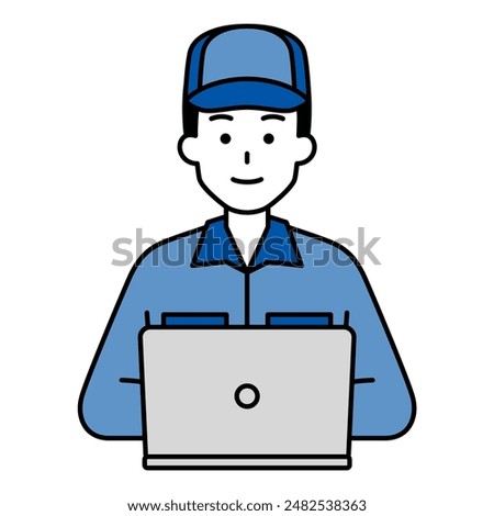 Male worker working on a laptop facing forward