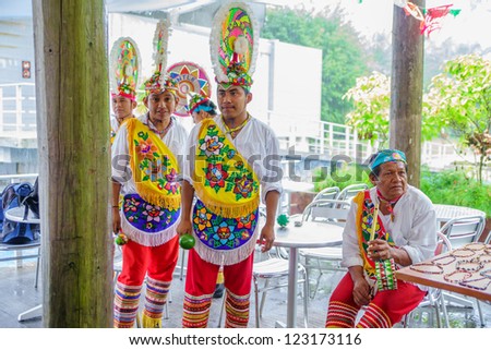 COZUMEL - DEC 12: Mayan dancers wait to perform in Cozumel on December 12, 2012. Dance is still a central component of social and political life for the Mayan and their mixed  Maya-Catholic rituals.