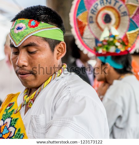 COZUMEL - DEC 12: Mayan dancer performs in Cozumel on December 12, 2012. Dance is still a central component of social and political life for the Mayan and their mixed  Maya-Catholic ritual practices.