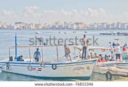 ALEXANDRIA, EGYPT - NOV 16: Boat trips for tourists and locals on November 16, 2010, at Alexandria, Egypt.  Alexandria is Egypt\'s second-largest city with a population of about four million.