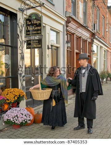 ELORA, ONTARIO - OCT 23: Actors in period costumes promote the quaint, historic downtown on October 23, 2011 in Elora, Ontario. Elora is renown for its 19th-century architecture and arts community.
