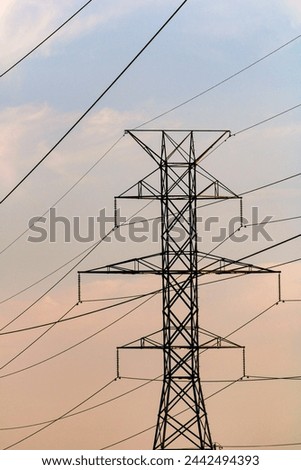 Similar – Image, Stock Photo Electric pylon in front of dramatic cloudy sky b/w photo