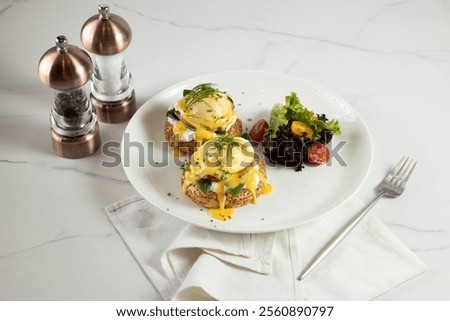 Similar – Image, Stock Photo Two poached eggs on brown bread