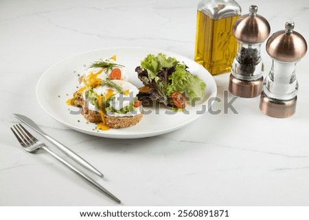 Similar – Image, Stock Photo Two poached eggs on brown bread