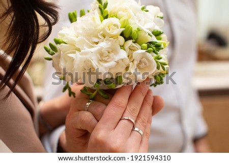 Beautiful and happy newlyweds marry each other and get married. New family and marriage. Registration at the registry office Foto stock © 