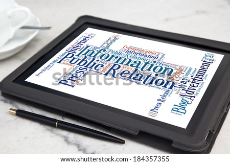 tablet with public relation word cloud
